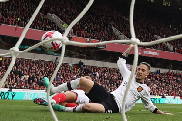 Manchester United's Brazilian midfielder Antony scores the opening goal of the English Premier League football match between Nottingham Forest and Manchester United at The City Ground in Nottingham, central England, on April 16, 2023. (Photo by DARREN STAPLES / AFP) / RESTRICTED TO EDITORIAL USE. No use with unauthorized audio, video, data, fixture lists, club/league logos or 'live' services. Online in-match use limited to 120 images. An additional 40 images may be used in extra time. No video emulation. Social media in-match use limited to 120 images. An additional 40 images may be used in extra time. No use in betting publications, games or single club/league/player publications. / 