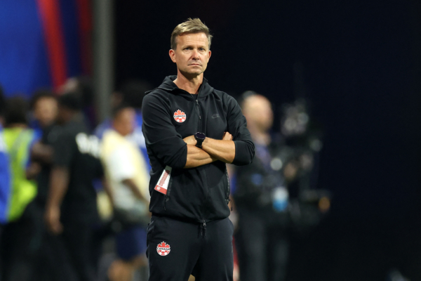 Canada's US coach Jesse Marsch watches his players from the touchline during the Conmebol 2024 Copa America tournament group A football match between Argentina and Canada at Mercedes Benz Stadium in Atlanta, Georgia, on June 20, 2024. (Photo by CHARLY TRIBALLEAU / AFP) 