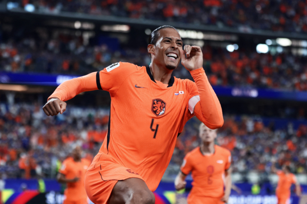 Netherlands' defender #04 Virgil van Dijk celebrates after scoring the opening goal during the 2026 World Cup Group F football match between the Netherlands and Japan at the Dallas Stadium in Arlington on June 14, 2026.