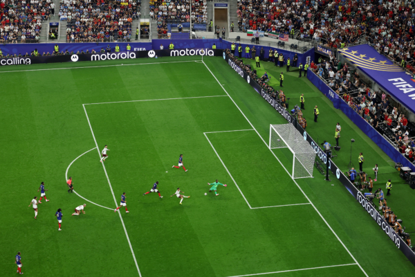ARLINGTON, TEXAS - JULY 14: Pedro Porro #12 of Spain scores his team's second goal past Mike Maignan #16 of France during the FIFA World Cup 2026 Semi Final match between France and Spain at Dallas Stadium on July 14, 2026 in Arlington, Texas.