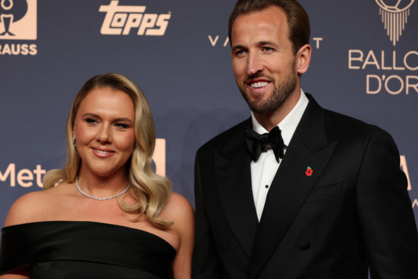 England and Bayern Munich forward Harry Kane and his wife Katie Goodland pose upon their arrival to attend the 2026 Ballon d'Or France Football award ceremony at the Palladium Theatre in London on October 26, 2026.